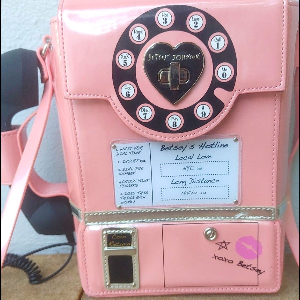 New Betsey Johnson unique and Betsey fun cross body bag.